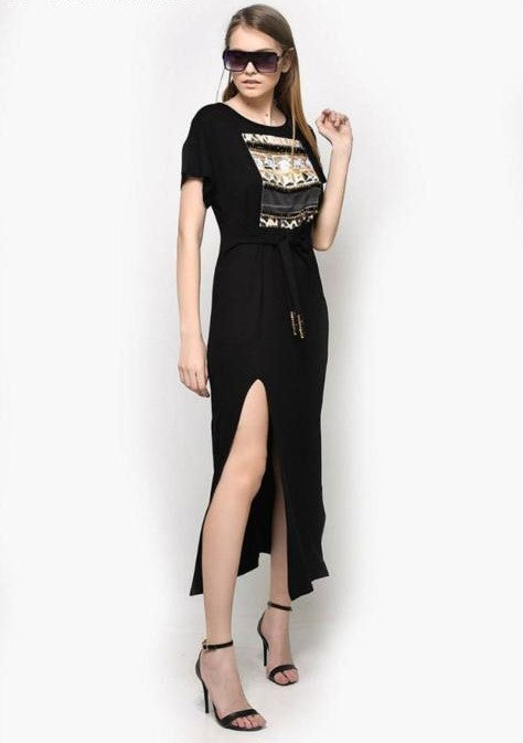 Long black dress with appliqués